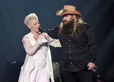 Pink and chris stapleton - Country singer Chris Stapleton and pop singer Pink have a new song together called “Love Me Anyway” for her new album called “Hurts 2B Human”. The piano ballad is a collaboration of two artists from two very different genres coming together to create a stunningly beautiful song. Pink co-wrote the track with Allen Shamblin and Tom ...